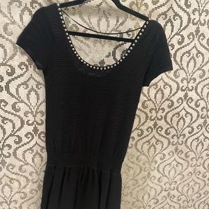 Black Sandro Mini Dress with collarbone metal decal